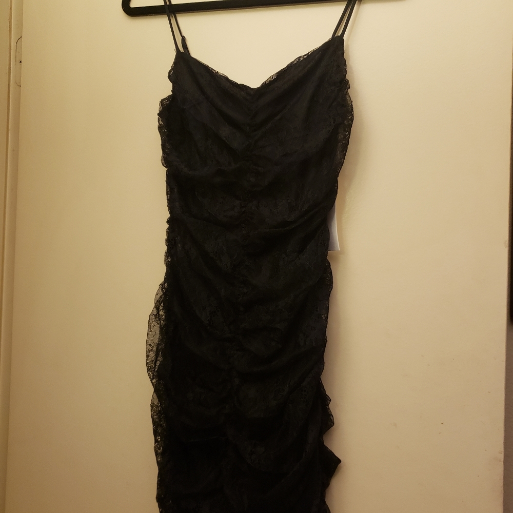 LUSH, Lace black ruffle mini dress new never worn. Small large